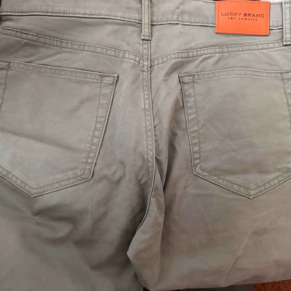Lucky brand khaki fabric jean cut. Straight leg. Never worn.